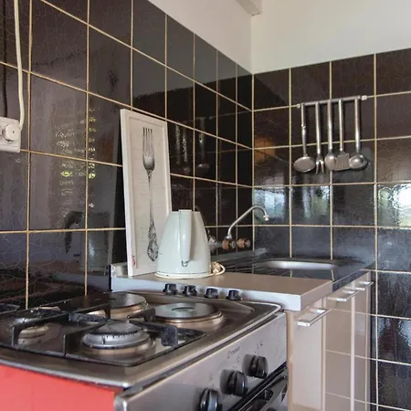 Holiday home Lovely In With Kitchen